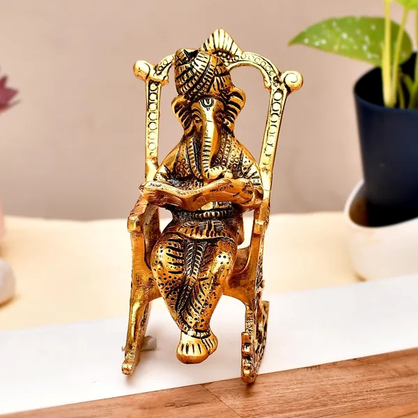 Gold_Ganesh_Reading_Ramayana_On_Chair_Decorative_Showpiece