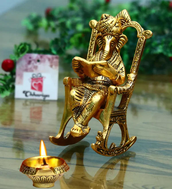 Golden_Metal__Lord_Ganesha_Reading_Ramayana_Statue_Hindu_Ganesh_Ganpati_Sitting_On_Chair_With_Kuber_Diya_Idol_Sculpture_For_Home_Office_And_Gifts_Decor