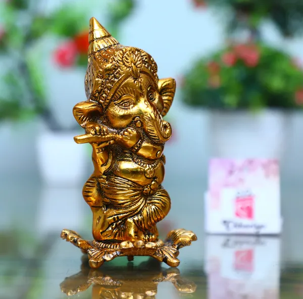 Gold_Metal_Lord_Ganesh_Playing_Flute_Decorative_Showpiece