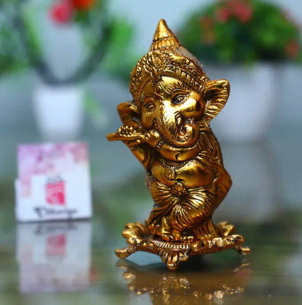 Gold_Metal_Lord_Ganesh_Playing_Flute_Decorative_Showpiece