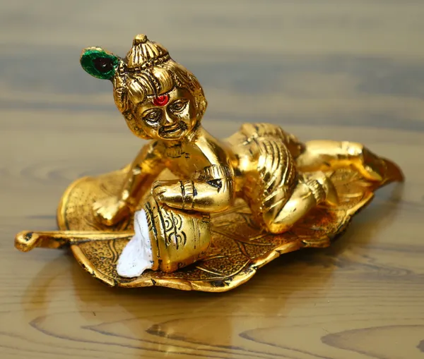 Golden_Metal_Krishna_Sitting_On_Leaf_Makhan_Chor_For_Gift_And_Pooja_For_Home_And_Office_Decorative_Showpiece