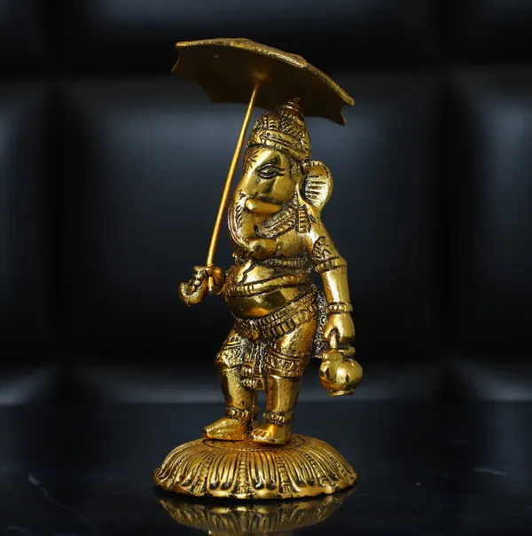 Golden_Metal_Ganesh_Idol_With_Kuber_Diya_For_Home_And_Office_Decorative_Showpiece
